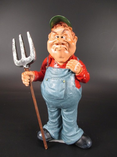 Bauer mit mistgabel farmer - bauer,